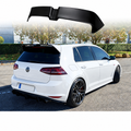 Alerón look Oettinger negro brillo montado en Volkswagen Golf 7 blanco