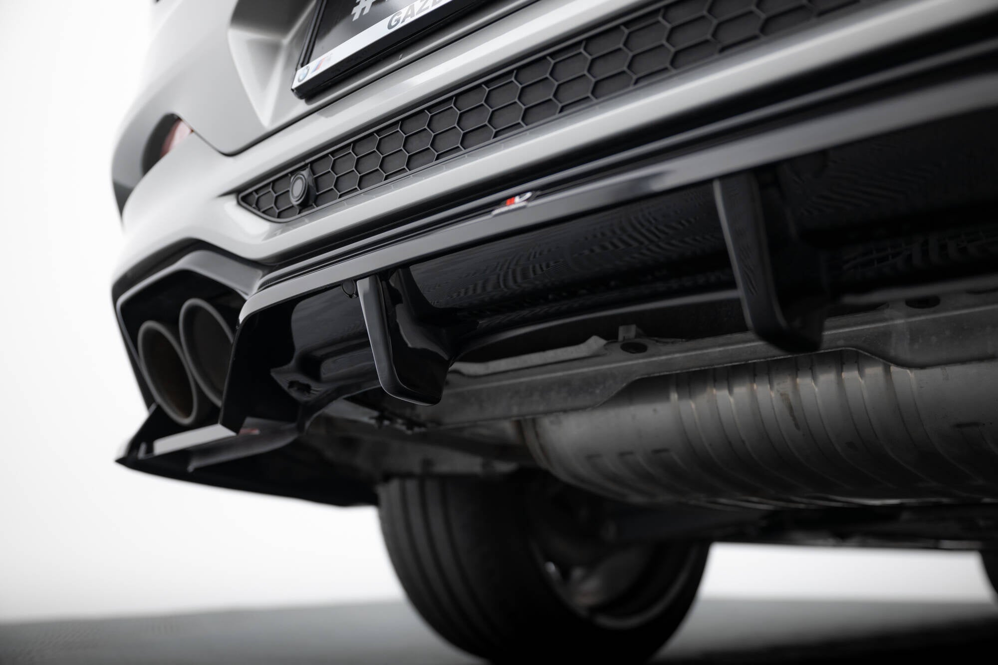 Splitter trasero BMW X4 M F98 (con barras verticales)
