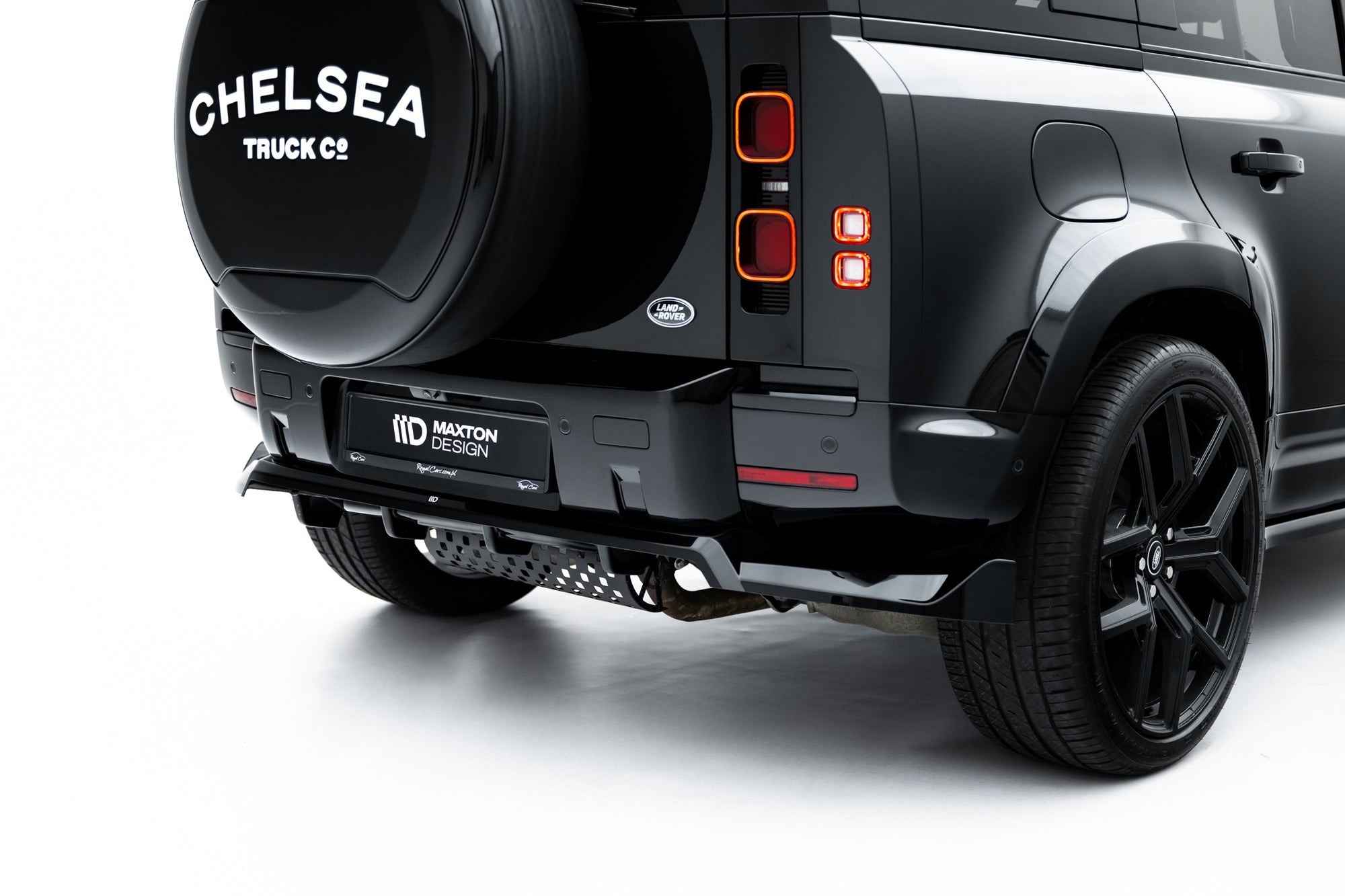 Splitter trasero Land Rover Defender Mk4 (con barras verticales)
