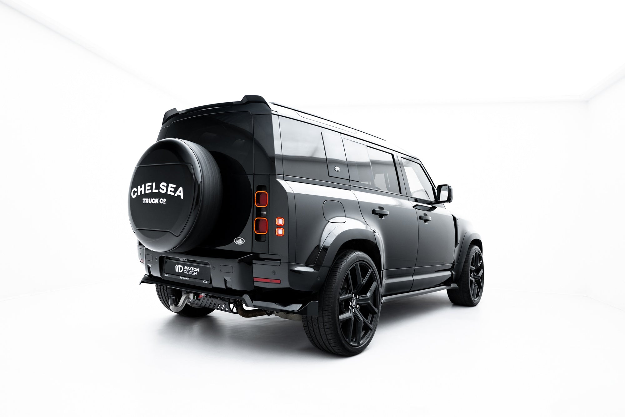 Splitter trasero Land Rover Defender Mk4 (con barras verticales)