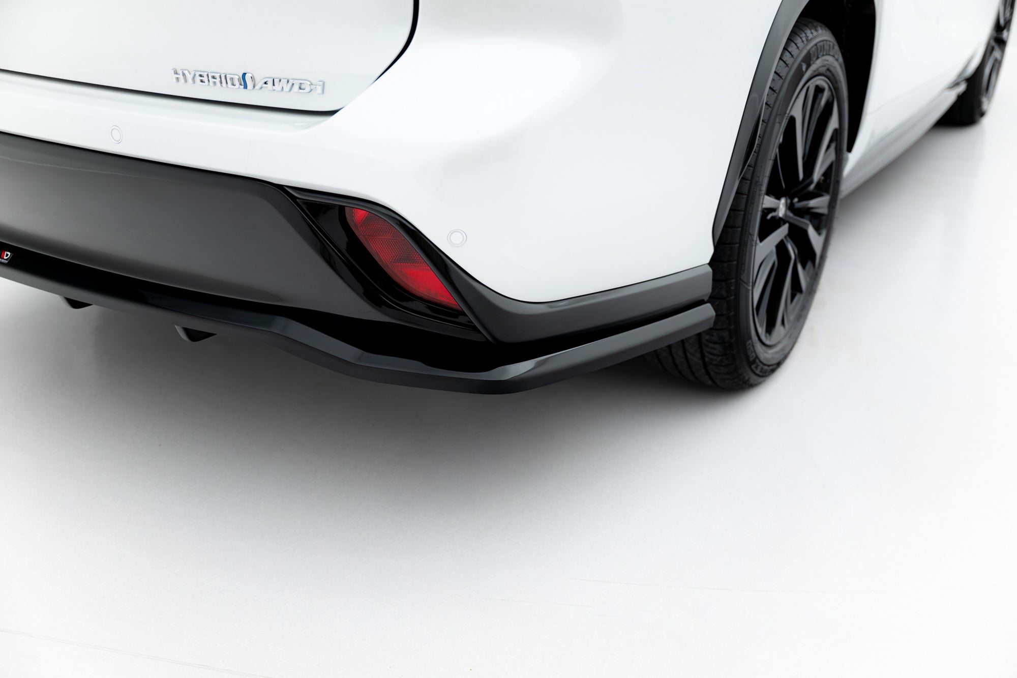 Splitter trasero Toyota Highlander Mk4 (con barras verticales)